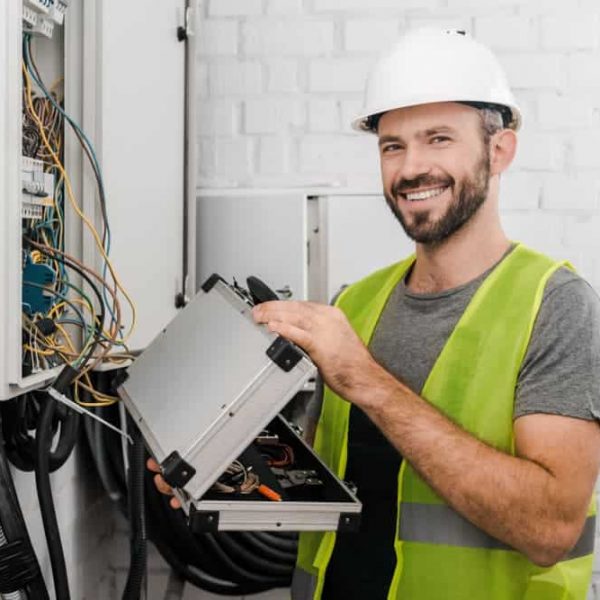 Smiling electrician — John McEwan Electrical in Wollongong, NSW